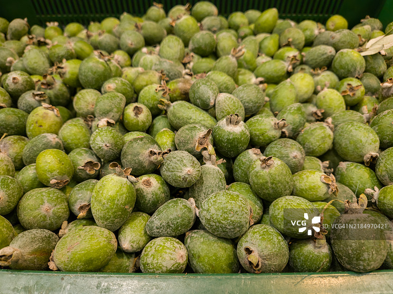 费约阿背景，费约阿在商店的柜台上，费约阿靠近。图片素材