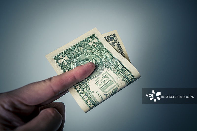 手握美元图片素材