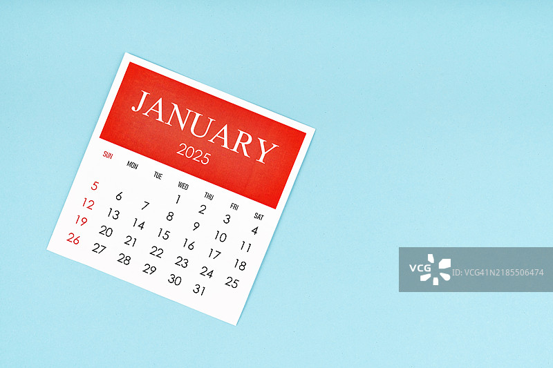 2025年1月的日历用于在蓝色背景上规划日常工作和生活。图片素材