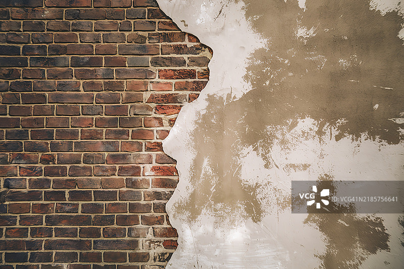 一面墙的照片，展示了两种材料的独特对比。图片素材