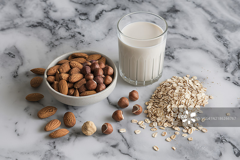 一张杏仁、榛子、燕麦和一杯米奶的照片图片素材
