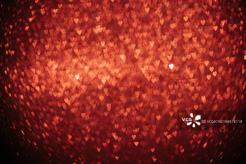 浪漫的红色心形图案为情人节庆祝活动营造了温馨的氛围图片素材