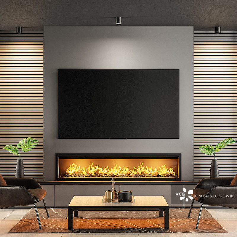 舒适现代的客厅，墙上挂着电视，简约的壁炉图片素材