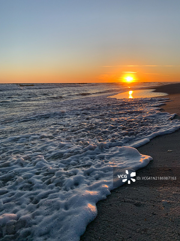 日落时分的海景，阿拉巴马州橙色海滩，美国图片素材