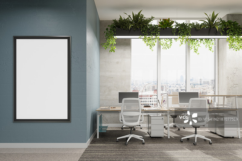 现代开放式空办公室，墙上有爬藤植物和空白海报的特写视图图片素材