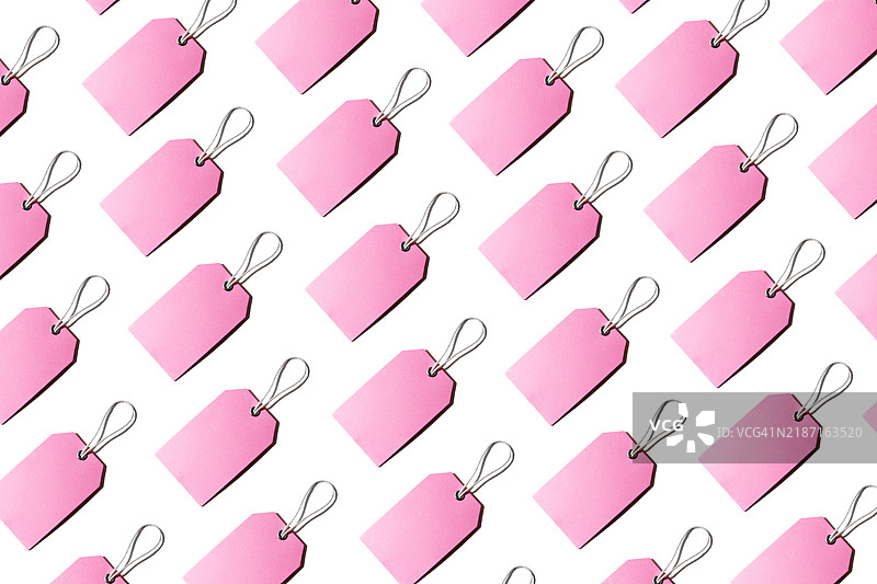 粉色零售促销标签在白色背景上的无缝图案图片素材