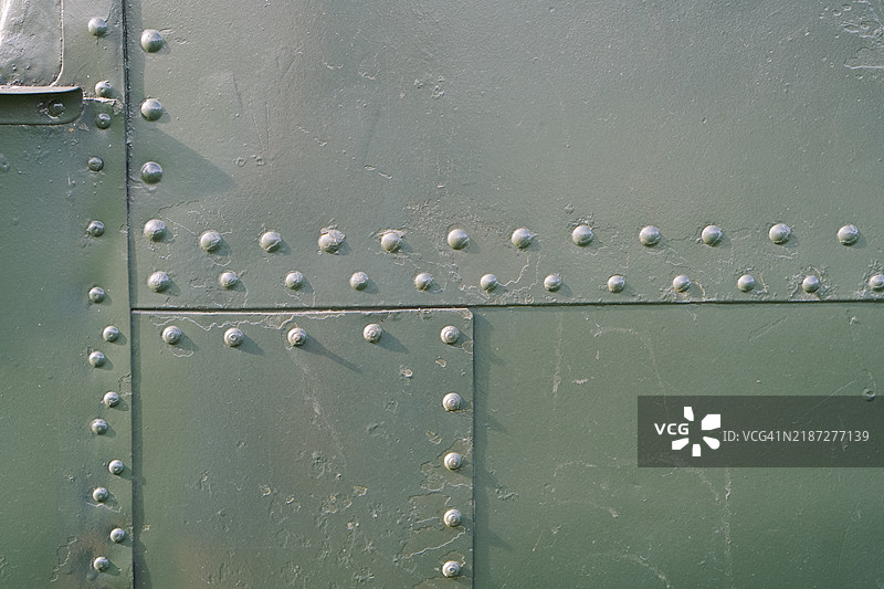 金属飞机铆钉和表面纹理的特写镜头图片素材