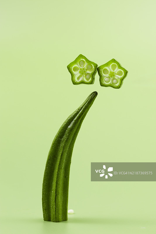 绿色背景上的秋葵图片素材