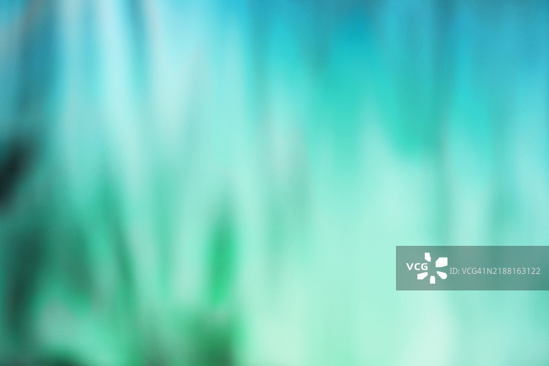 模糊的绿色和蓝色背景，柔和的渐变混合图片素材