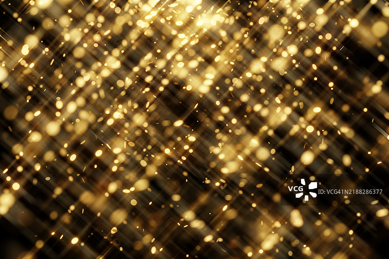 模糊的金色粒子在黑色背景上。节日背景。为您的设计提供节日多彩的背景。圣诞快乐，新年快乐。图片素材