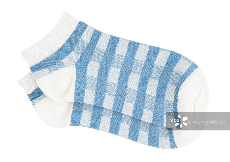 一双柔软的蓝色袜子孤立在白色背景上，保存剪切路径。图片素材