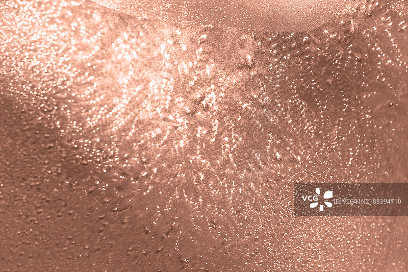 闪亮的玫瑰金纹理，营造出奢华的背景图片素材