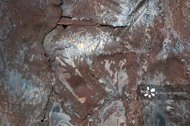 生锈齿轮和金属废料的拼贴画图片素材