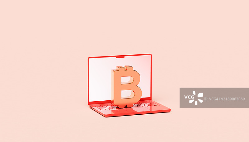 红色笔记本电脑上带有比特币符号，代表数字金融概念图片素材