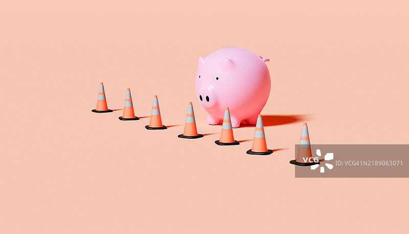 交通锥排成一行，后面有一个储蓄罐图片素材