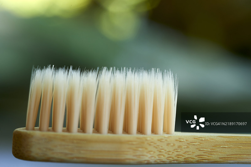 竹制牙刷刷毛特写，宣传口腔卫生图片素材