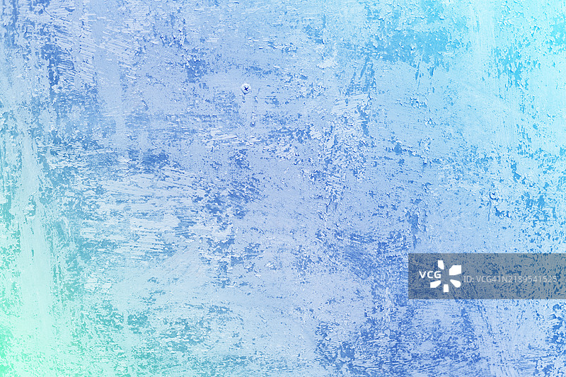 浅蓝色和绿色的纹理背景营造出宁静的氛围图片素材