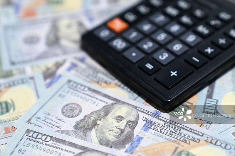 美元和计算器，金钱概念图片素材