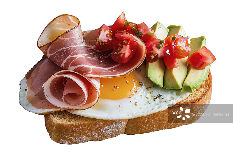 烤面包配煮蛋、火腿片、切丁番茄和鳄梨图片素材