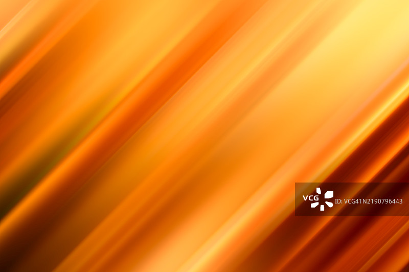 橙色运动模糊背景。抽象的黄色和橙色渐变模糊运动背景，抽象模糊艺术背景，温暖色调的夏季风格光影运动。图片素材