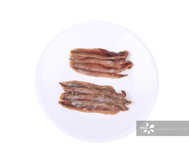 高角度视图的白色背景上的盘子里的肉图片素材