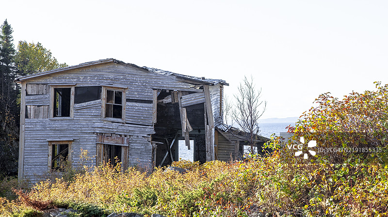 废弃的房屋在幽灵港口图片素材