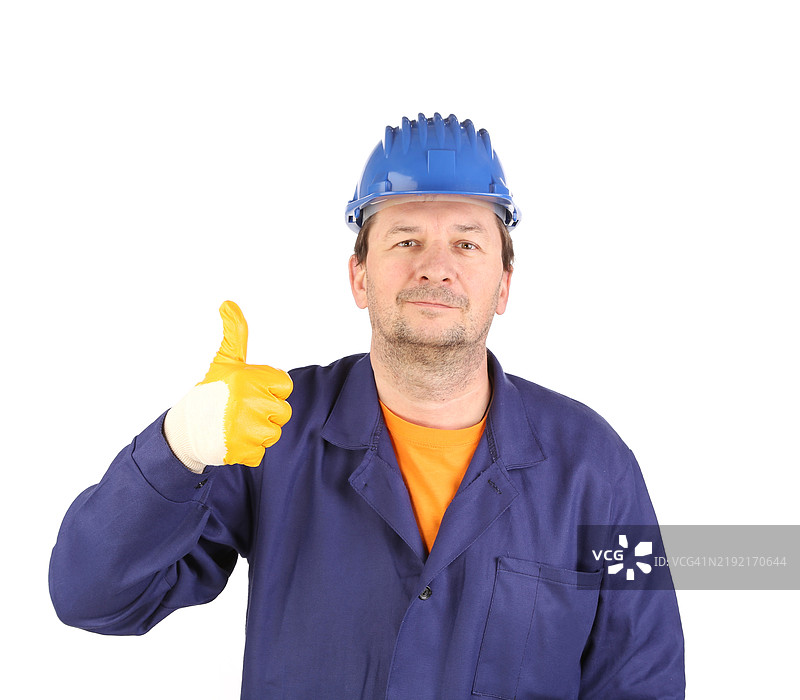 戴着黄色手套的男人竖起大拇指图片素材