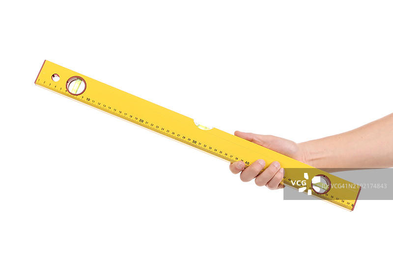 手中拿着黄色工具图片素材