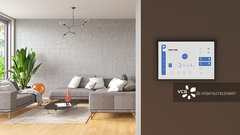 现代客厅墙上的智能家居控制器图片素材