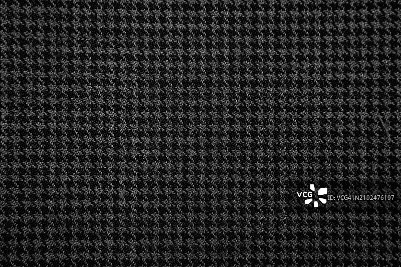 黑色、灰色和磨损效果的抽象背景。图片素材