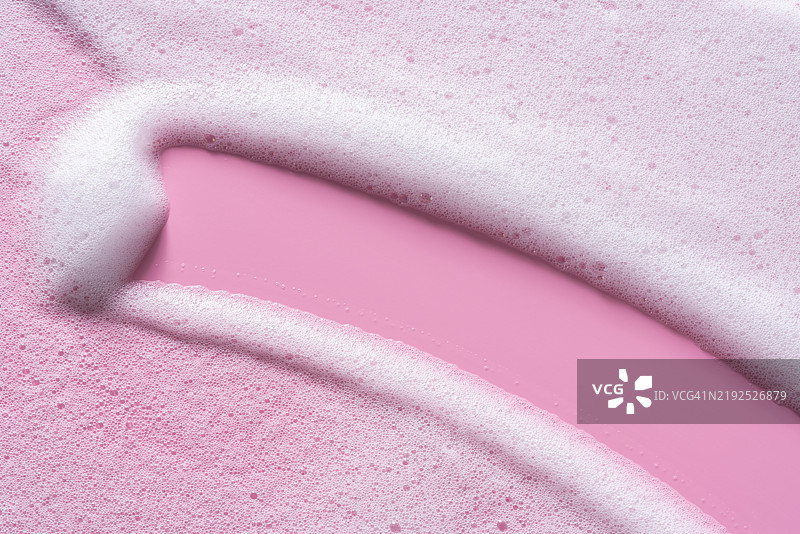 在白色肥皂泡沫上擦去空白区域图片素材