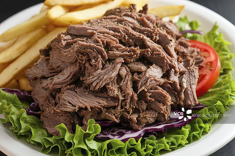 一盘旋转烤肉的照片图片素材