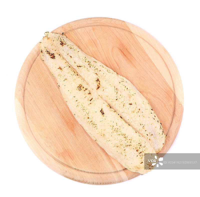 切割板上的面包特写，背景为白色图片素材