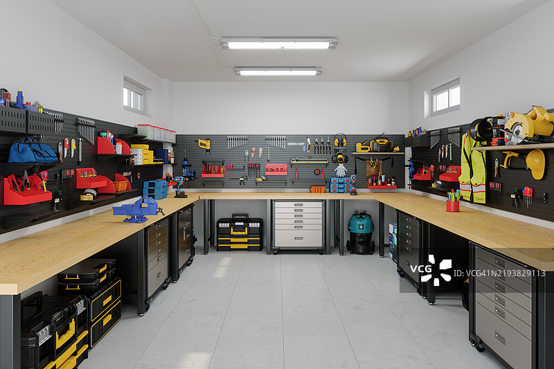 空荡荡的车库内部，配有工具、工作设备和工具箱图片素材