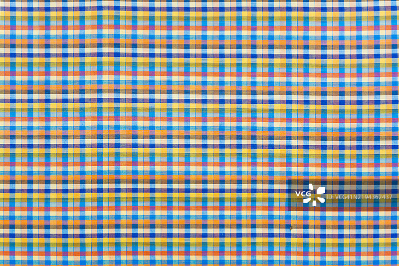 泰国传统腰布或蓝色格子棉布纹理作为背景。图片素材