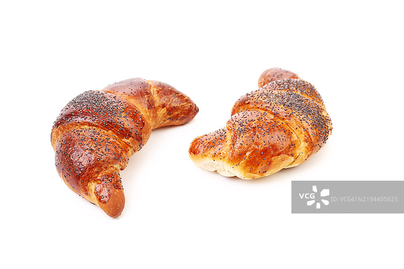 白色背景下的可颂面包特写图片素材