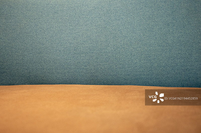 蓝色和棕褐色的双色纹理背景图片素材