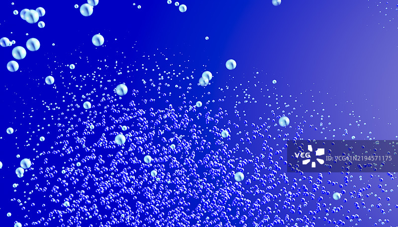 蓝色液体中漂浮的小气泡图片素材