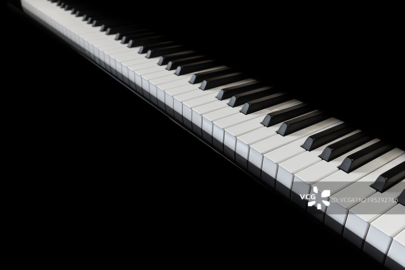 黑色背景下的钢琴和钢琴键盘。图片素材