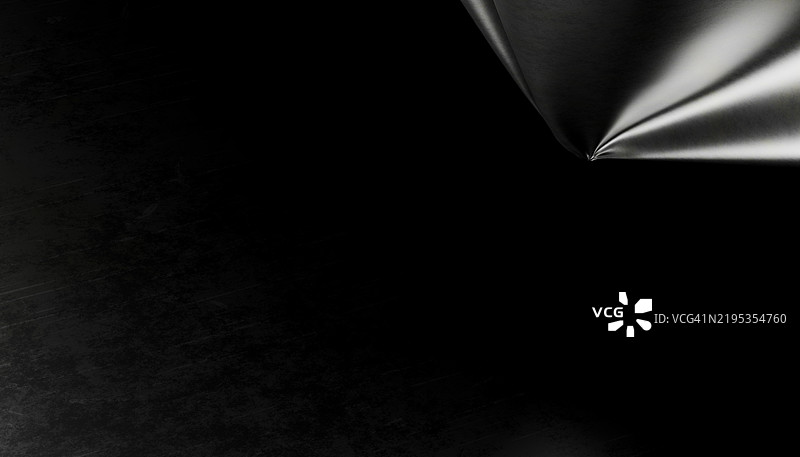 抽象金属薄片在黑色背景上坠落图片素材