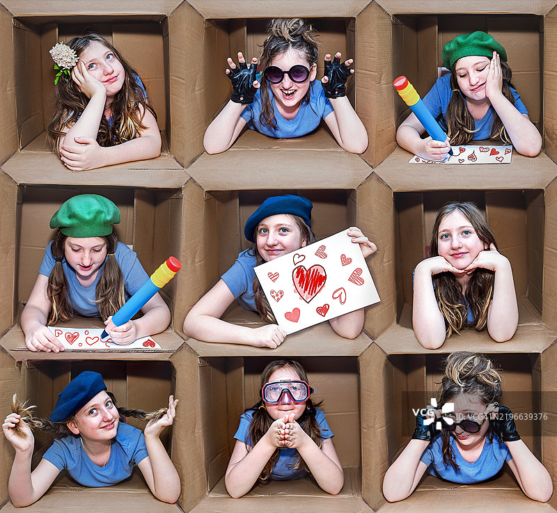 青春期女孩制作情人节卡片。创意照片拼贴在纸箱中。图片素材