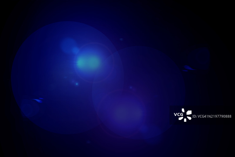 明亮的蓝色镜头光晕营造出梦幻般的氛围图片素材