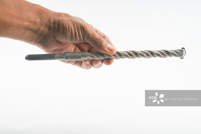 马来西亚白色背景下手持电钻工具的特写图像图片素材