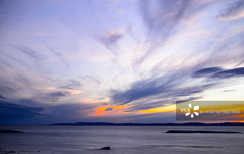 海岸线上的梦幻日落图片素材