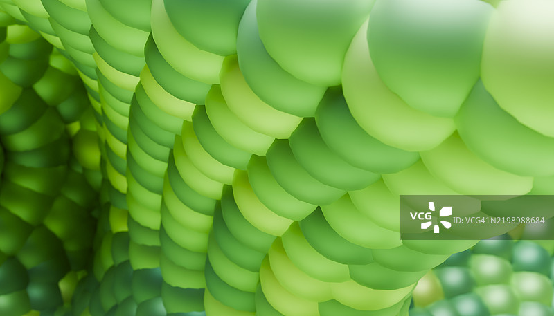 抽象的绿色球体形成了一个有纹理的表面图片素材