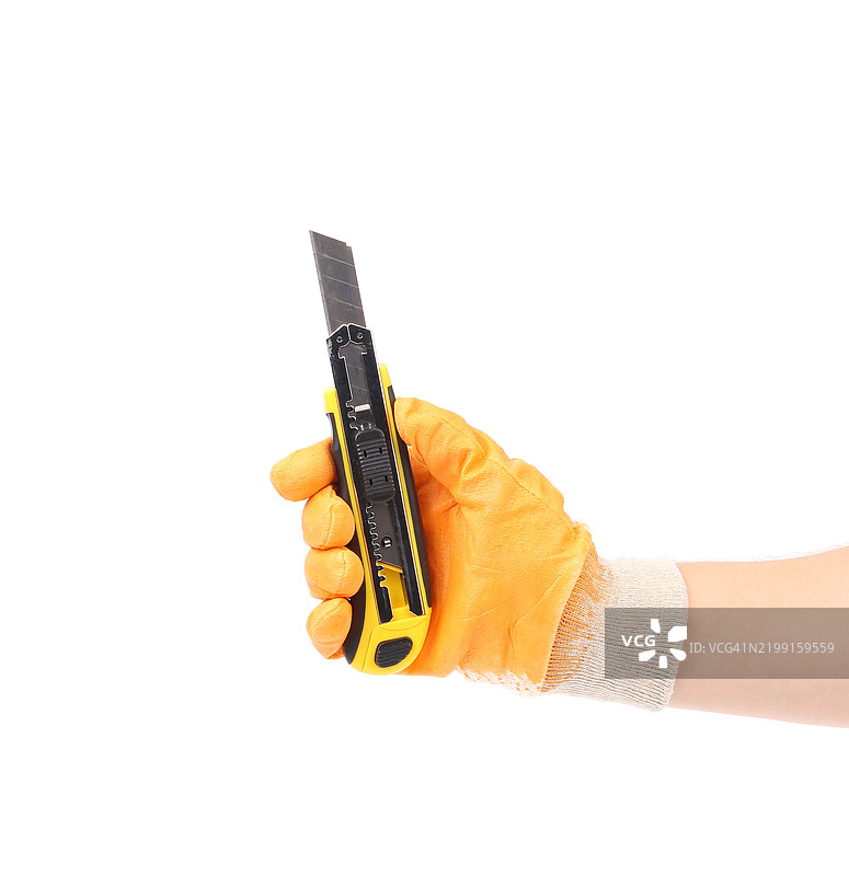 白色背景下的手握工具特写图片素材