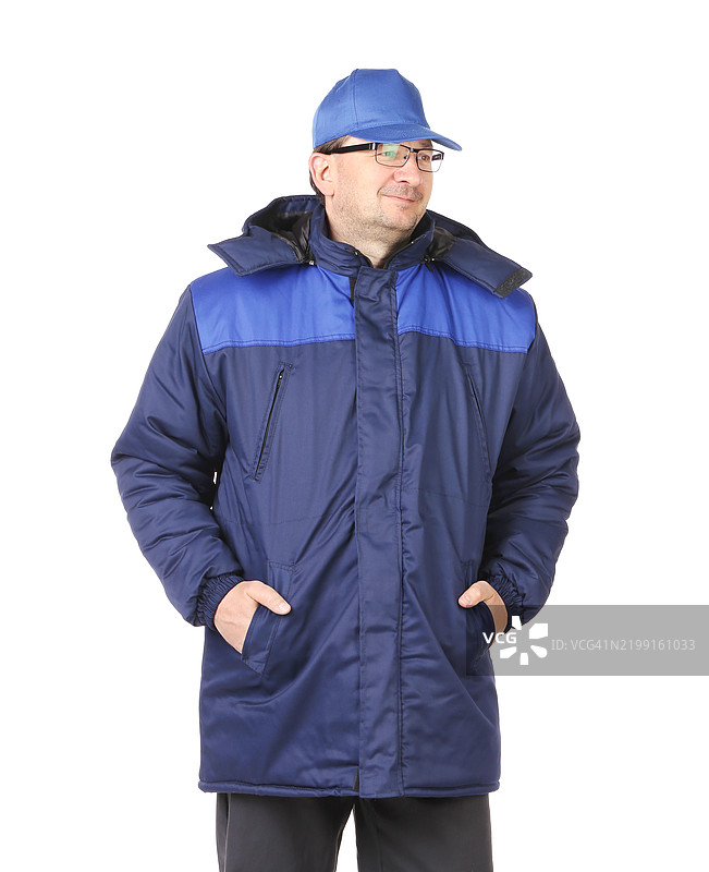 机械师站在白色背景前的肖像图片素材