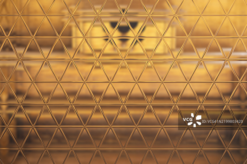 镜面反射出金色调的家具元素。图片素材