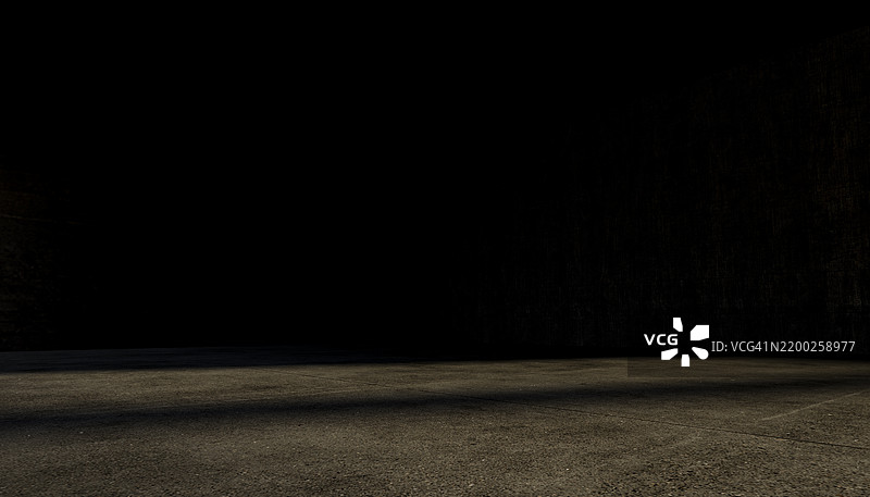 空旷黑暗的空间，混凝土地面和光束图片素材