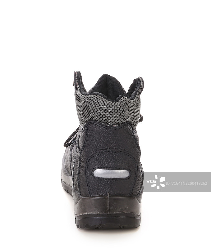 黑色鞋子特写，带有灰色斑点图片素材